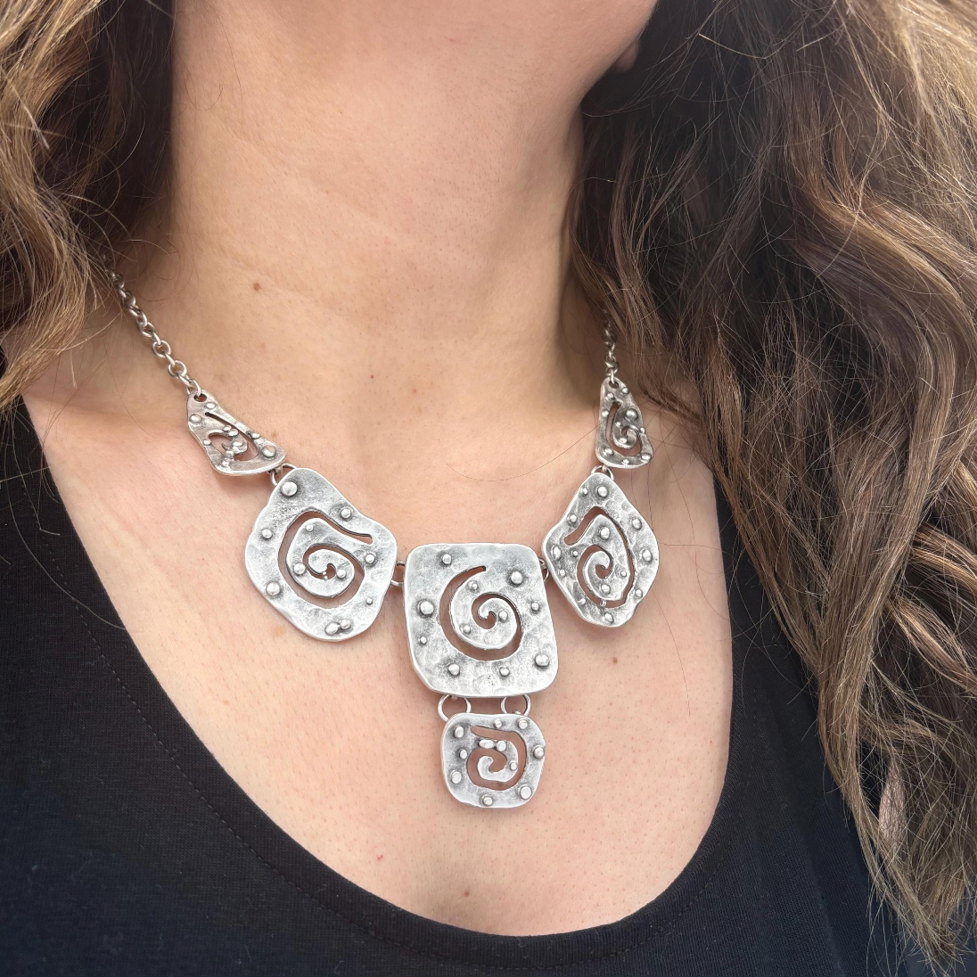 Ethic inspired large silver plate necklace for a bold fashion statement.